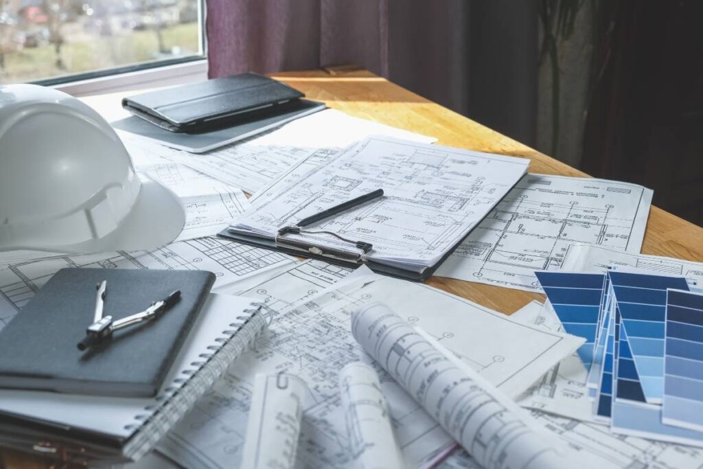 Architects concept, engineer architect designer freelance work on start-up project drawing, construction plan.